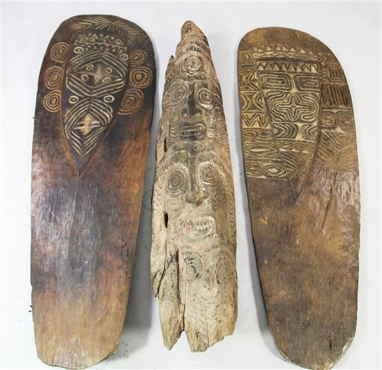 A Sepik River wooden ancestor spirit board and two other boards